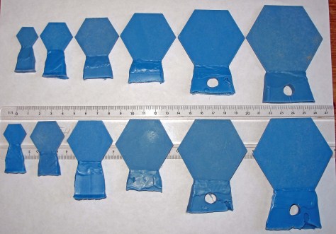 Blank hexagonal shapes in blue casting wax, ready to be personalized in the next art workshop.